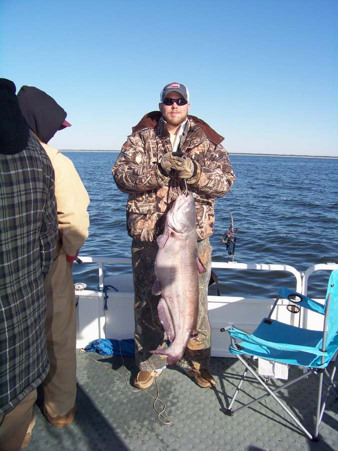 Ryan with the biggest fish of the day at 31lbs.  11-19-08          