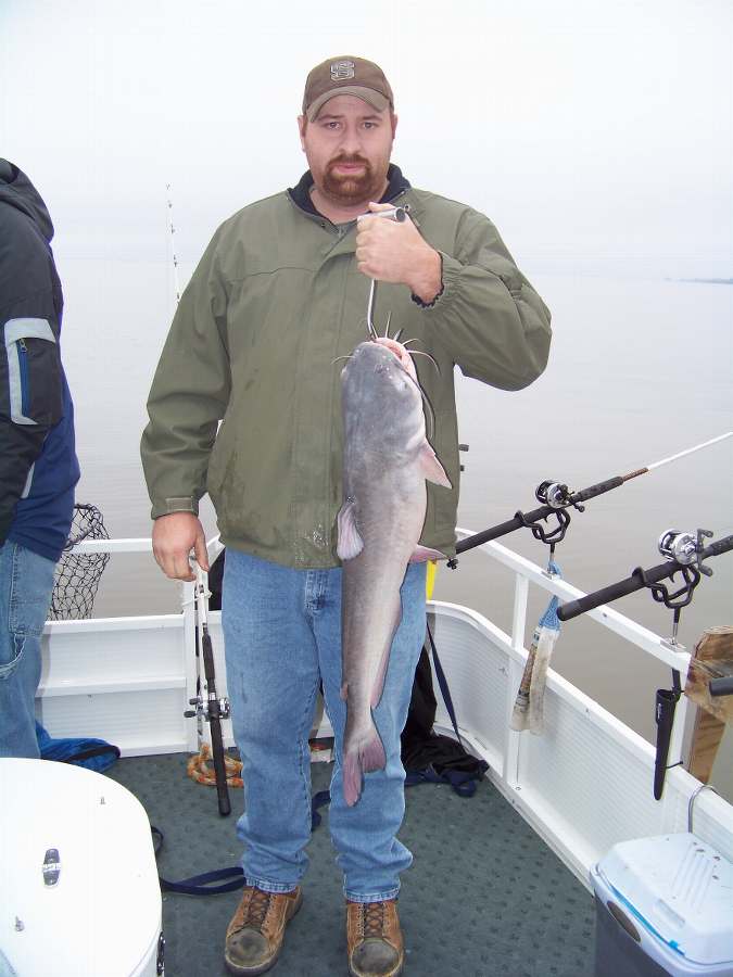 James with the only fish of the day.  The worse day ever on my boat and it didn't cost the customer one dime.  In fact they are planning another trip in April. 1-3-09