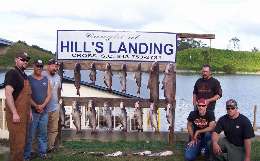 Mike, Colin, John, Josh, Henry, and Jeremiah on the second day after the winds let down for us to go fishing instead of hiding.  Twenty one fish for the day with two of them over 30 pounds each!  10-13-08