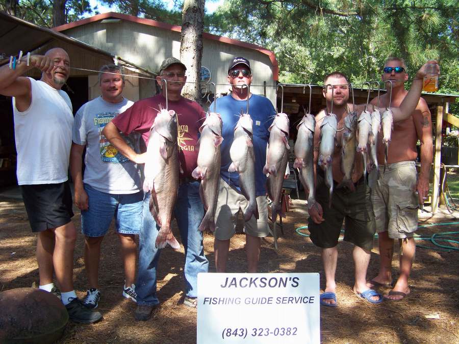 SCOTT, DAVID, PETE, GARY, EAGLE, AND RICK WITH THEIR DAYS CATCH.  10 FISH BEFORE 11:00 AND NOT A FISH AFTER THAT.  6-7-08
6-7-08  