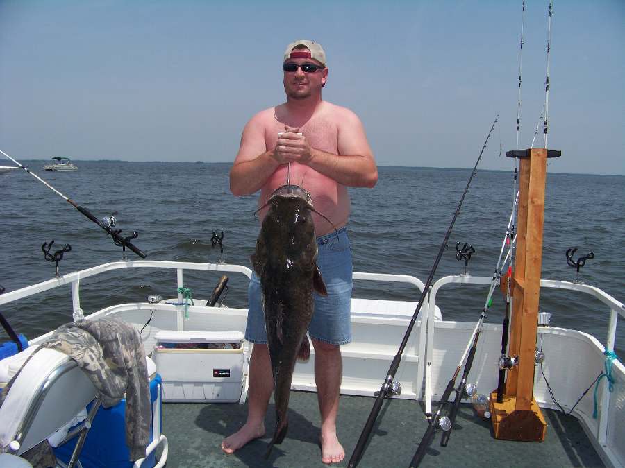 PERRY IS ALL SMILES HOLDING HIS 32LB.+ FLATHEAD, THE BIGGEST OF 15 FISH FOR THE DAY!
5-10-08