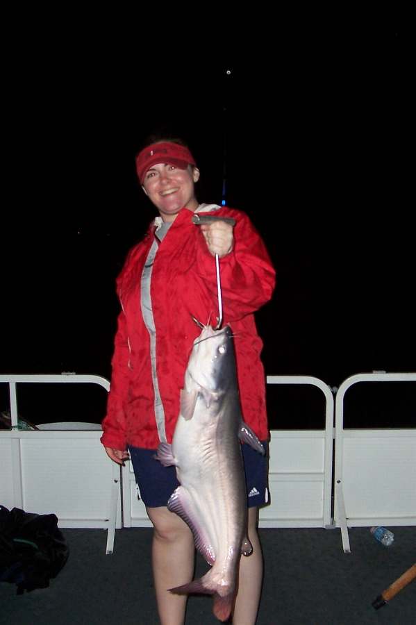 BETH WITH HER BIGGEST FISH TO DATE, A 18 LB. BLUE!  6-27-08  ALL 18 FISH RELEASED!