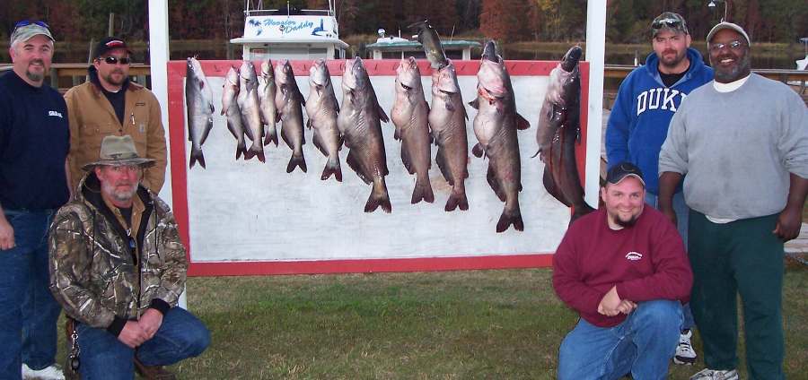 Ricky, Eddie, Jeramiah, Roger, Lamont, and Chris show off their catch of Lake Moultrie blues.  Big fish were 36 and 39 lbs.  11-9-08