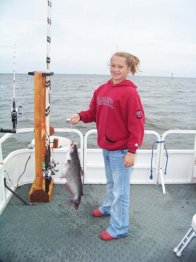 Miss Kayla with her biggest fish ever, an 11lb. blue.  9-20-08