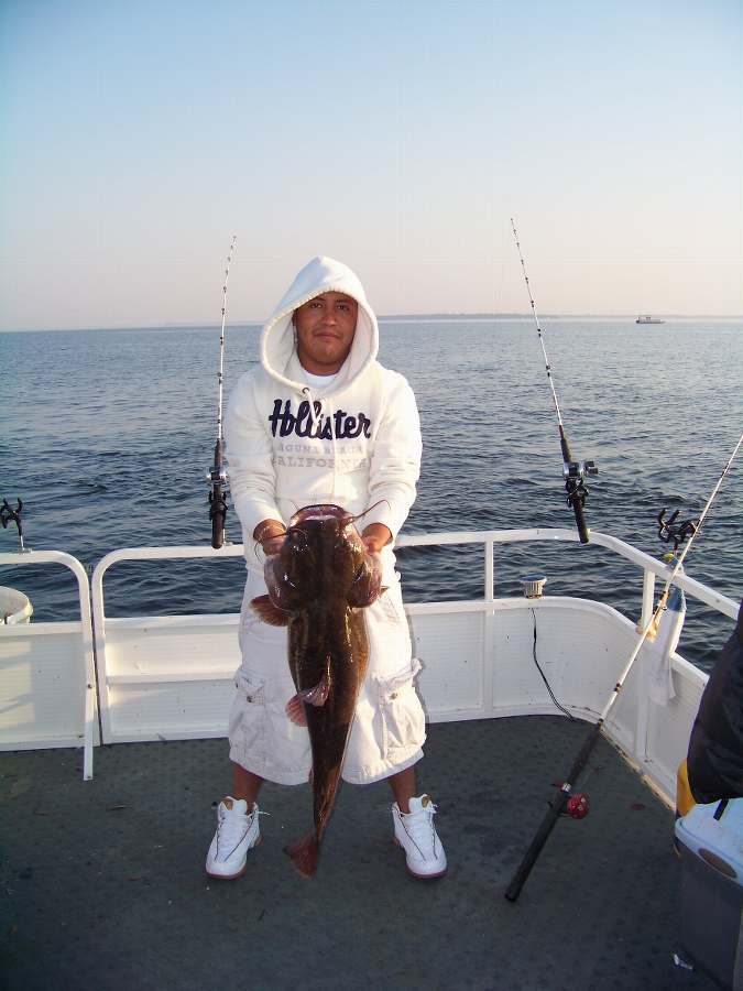 THE FIRST FISH OF THE MORNING, A 22LB. FLATHEAD!  10-4-08