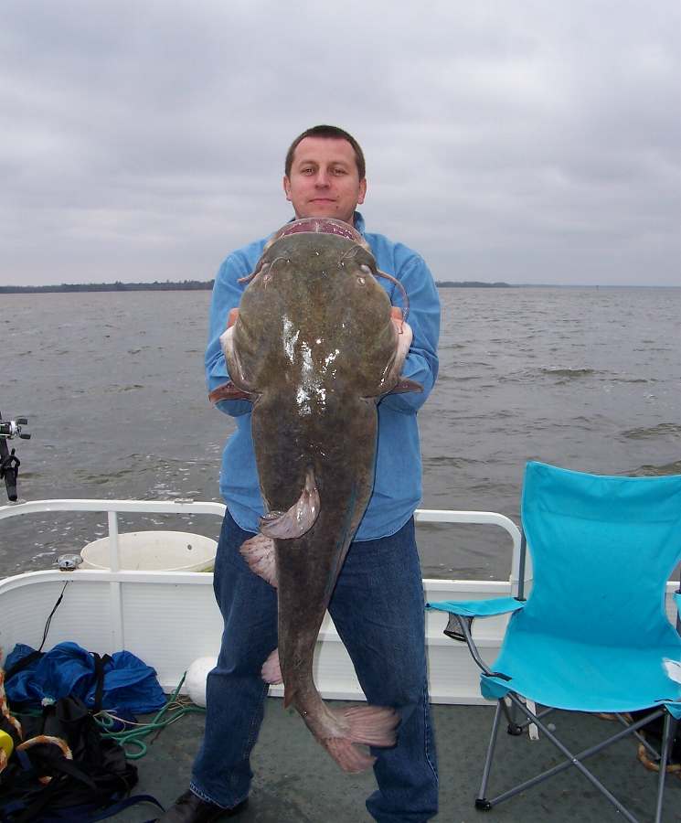 WE HAVE A NEW BIG FISH WINNER FOR THE YEAR! 12-20-08
SLAVY WITH A 45+ POUND FLATHEAD! 