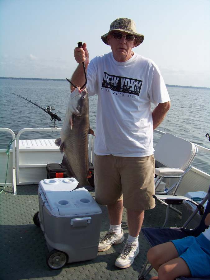 POPS SHOWING OFF HIS BEST FISH OF THE DAY
6-14-08