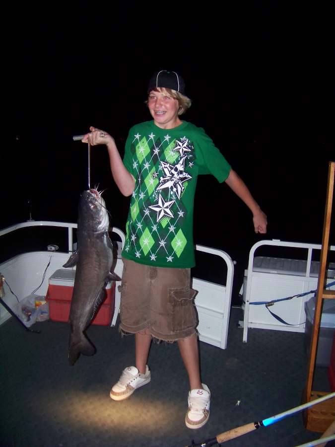 BRETT WITH HIS BIGGEST FISH OF THE NIGHT...8-16-08 