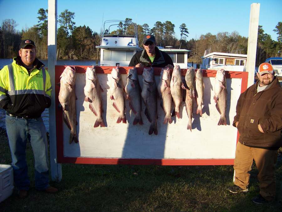 TRINT, TRIPP, AND DENNIS WITH A DECENT CATCH ON A DAY WHEN WE SHOULD HAVE STAYED HOME ON 25MPH.+ WINDS AND VERY COLD!  12-28-09