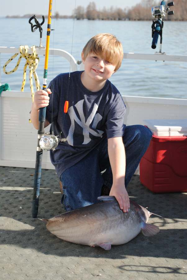 DAVID WITH THE LAST FISH OF THE DAY...ANOTHER 20 POUNDER!  HAPPY BIRTHDAY!!!  12-31-10