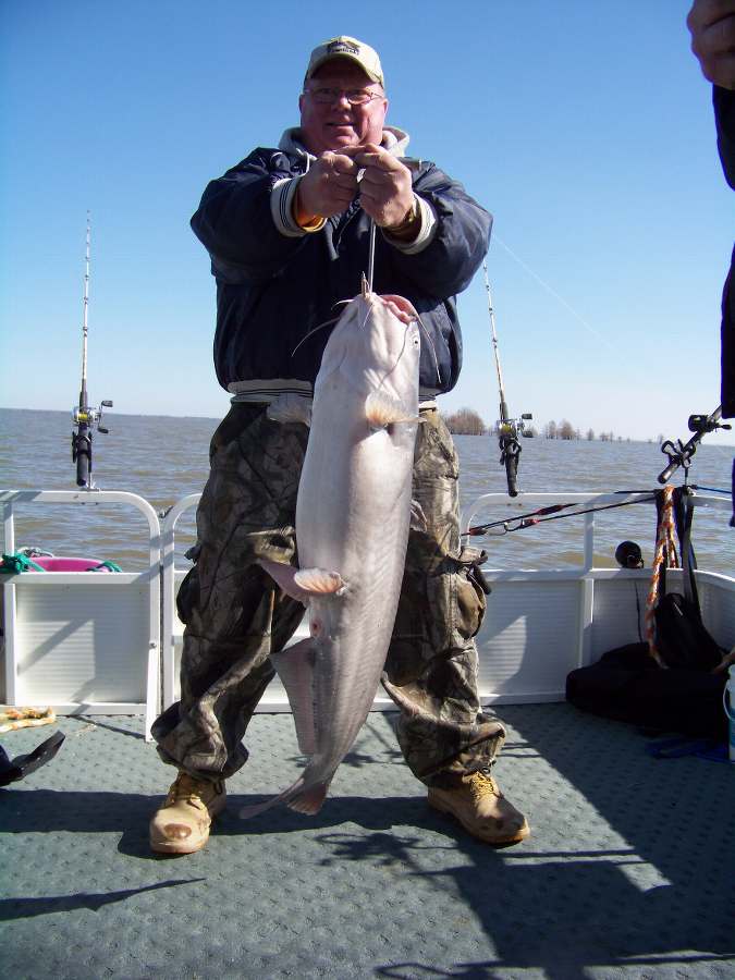JOHN WITH THE SECOND 30 POUND+ FISH THAT MADE IT TO THE BOAT ON 3-6-10